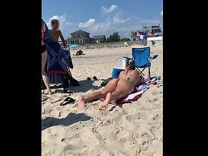 Thick girl having fun in ocean waves and suntanning Picture 5