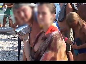 Video shots from a crowded nudist beach Picture 3