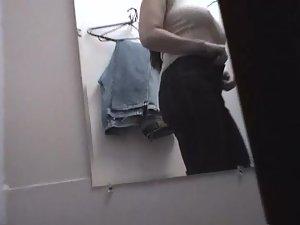 Pierced boobs spied while she dresses up Picture 4