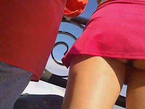 Hot ass peeks out of her miniskirt Picture 2