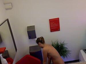 Peeping on naked girl before she gets in tanning bed Picture 1