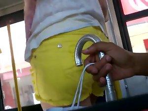 Tight little ass in yellow shorts Picture 8