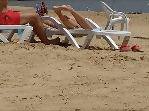 Voyeur checks out lucky guy's curvy girlfriend on beach Picture 3