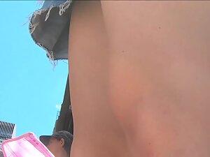 Fluffy skirt shows ass and pussy slip in upskirt Picture 4