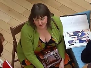 Big busty lady spied while selling hats