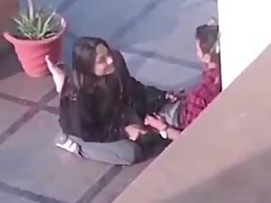 Slutty girl gives a shy blowjob in a public street