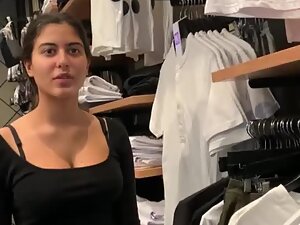 Store clerk with adorable smile and big tits