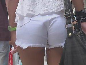Tanned girl in tight white shorts Picture 6