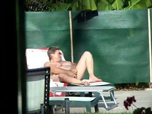 Milf thinks she's all alone at a pool Picture 2