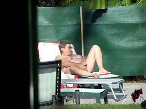 Milf thinks she's all alone at a pool Picture 3