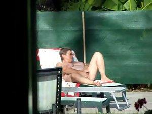 Milf thinks she's all alone at a pool Picture 4