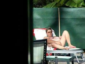 Milf thinks she's all alone at a pool Picture 8