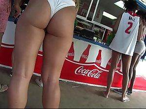 Muscular kind of thick girl looks great in white bikini Picture 6