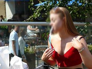 Teen beauty fixing her bra in public Picture 3