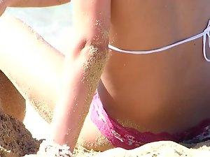 Slutty girl hiding her pussy on the beach Picture 5