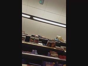 Upskirt of girl buying cereals in supermarket Picture 8