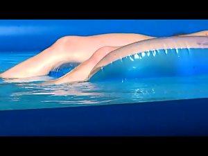 Peeping her naked floating at her pool Picture 2