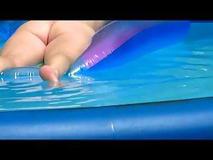 Peeping her naked floating at her pool Picture 4