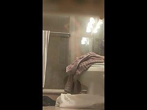 Peeping on naked sister's long shower from under the door Picture 1