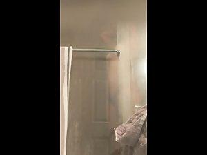Peeping on naked sister's long shower from under the door Picture 2