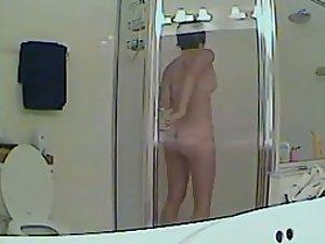 Chubby girl spied in a thorough shower Picture 1