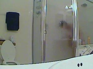 Chubby girl spied in a thorough shower Picture 4