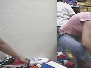 Hot big boobs of bent over girl in shoe store Picture 5