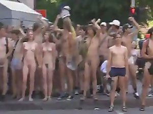 Naked students do a running protest