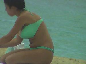 Big tits nearly falling out of bikini top Picture 2