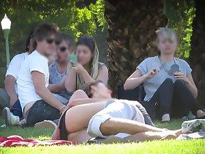 Upskirt of a horny and shameless girl in park Picture 2