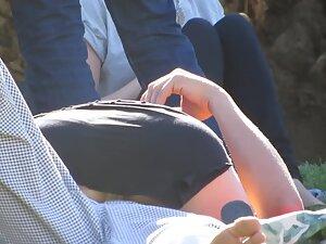Upskirt of a horny and shameless girl in park Picture 5