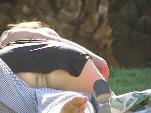 Upskirt of a horny and shameless girl in park Picture 7