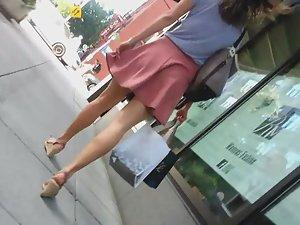 Skirt gets stuck between her buttocks