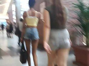Skinny black girl and white teen at mall Picture 4