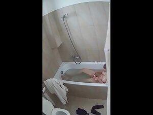 Hidden cam caught busty girl playing with her pubes in bathtub Picture 5