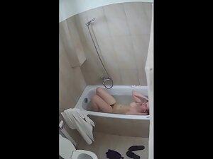 Hidden cam caught busty girl playing with her pubes in bathtub Picture 6