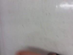 Thong slipped out when she crouched Picture 2