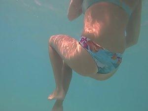 Voyeur swims close to hot teen girl
