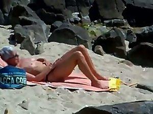 Peeping on a sun tanning woman Picture 1