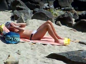 Peeping on a sun tanning woman Picture 2
