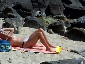 Peeping on a sun tanning woman Picture 4