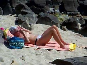 Peeping on a sun tanning woman Picture 5