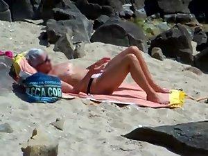 Peeping on a sun tanning woman Picture 6