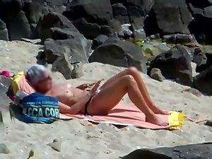 Peeping on a sun tanning woman Picture 8