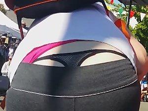 Milf's thong slips out like whale tail