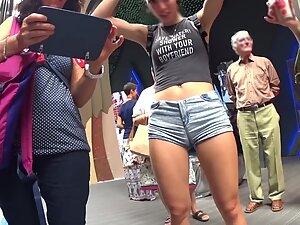 Tall girl isn't aware she shows cameltoe in shorts Picture 2