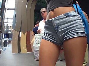 Tall girl isn't aware she shows cameltoe in shorts Picture 4