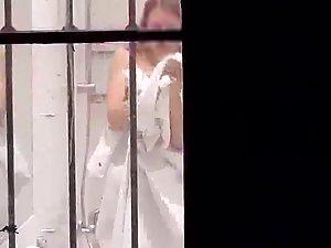 Peeping a sexy milf as she showers Picture 8