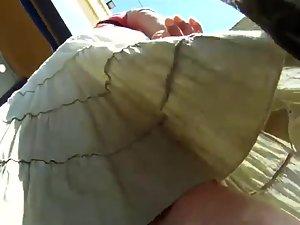 Peeping on her buttocks under a skirt Picture 3