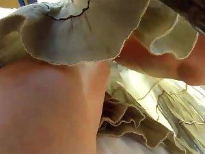 Peeping on her buttocks under a skirt Picture 4